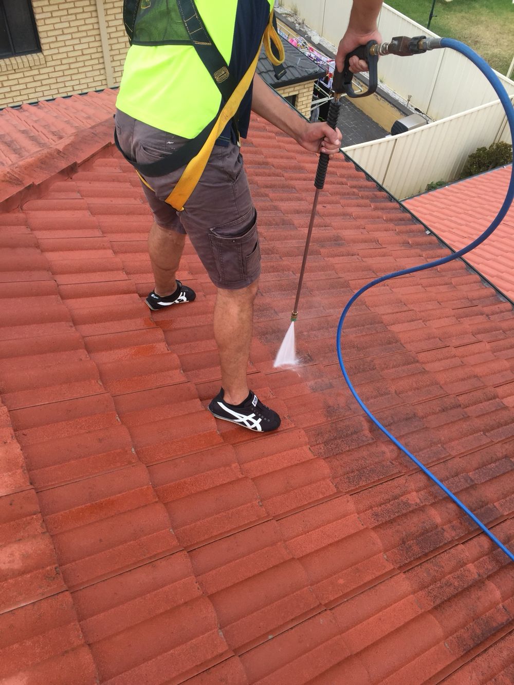 Roofline cleaning before and after